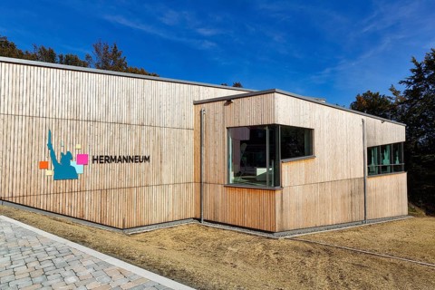 Visitor centre with inscription Hermanneum am Hermannsdenkmal, adventure world, tourist attraction,