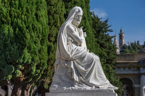Sculpture with plaque in front of the Pantheon in the Staglieno Monumental Cemetery, Cimitero