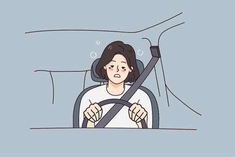 Tired young woman driving car feeling unwell suffer from health problems. Exhausted female driver