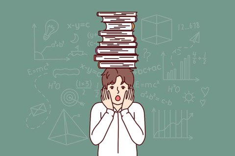 Frightened schoolboy with books on head feels fear of exam, stands near blackboard with formulas.