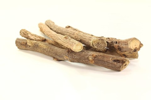 Liquorice-flavoured liquorice root against a light background