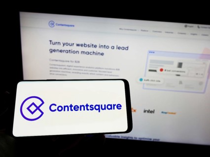 Stuttgart, Germany, 09-10-2022: Person holding mobile phone with logo of analytics platform company
