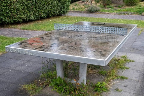 Table tennis table outside in the rain