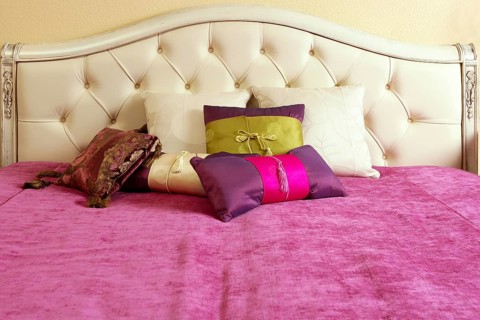 Diamond upholstery buttons bed head pink blanket colorful pillows