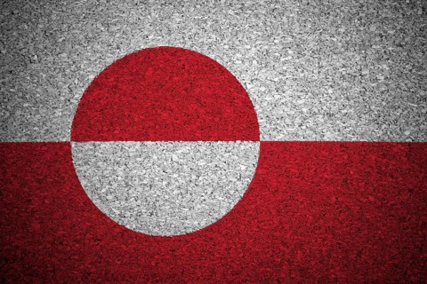 The Greenland flag painted on a cork board