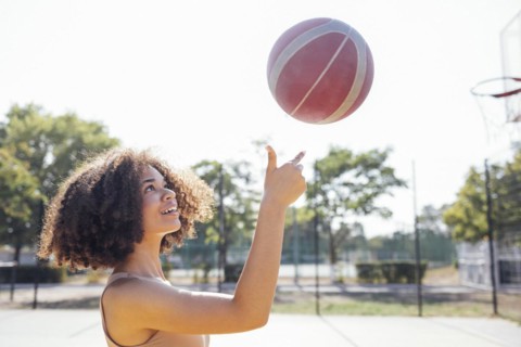 Mixed-race young smiling female outdoors and having fun. Stylish cool teen girl gathering at