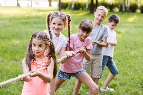 Kids having fun tug war