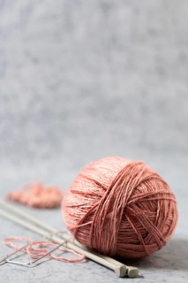 Front view pink thread knitting
