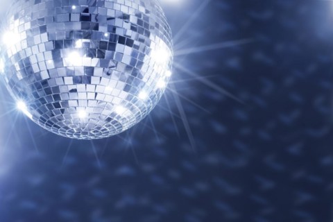 A Mirror disco ball hanging from the ceiling