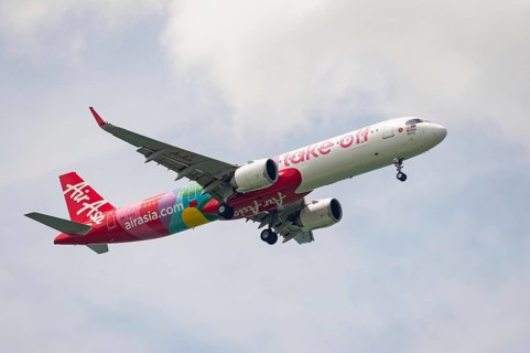 15.07.2023, Singapore, Republic of Singapore, Asia, An AirAsia Malaysia passenger aircraft of the