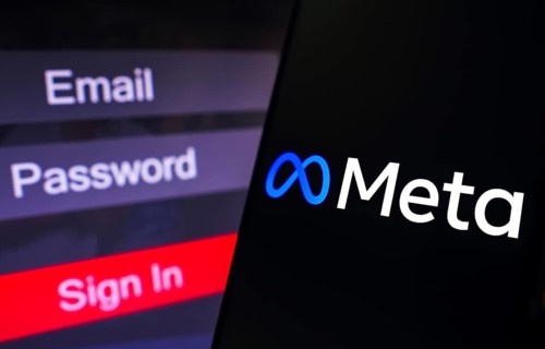 In this photo illustration, the Meta Platforms logo is displayed on a smartphone screen, next to a
