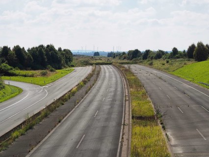 End of a motorway at the edge of the Garzweiler open-cast lignite mine, Rhenish lignite mining