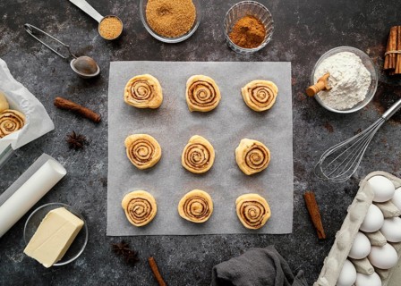 Flat lay cinnamon rolls spices