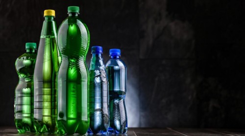 Plastic bottles of assorted carbonated soft drinks