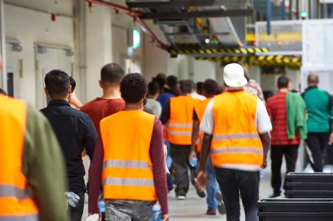 Staff shift change, men and woman leave the hall, Amazon Logistik Winsen GmbH, 21423 Winsen, Luhe,