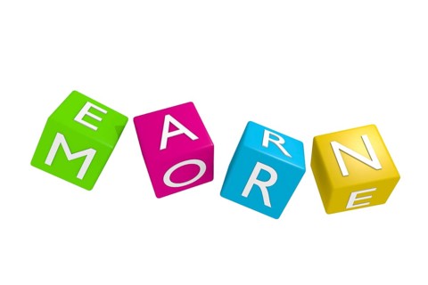 Colorful dies with the words Earn more, 3d rendering on a white background