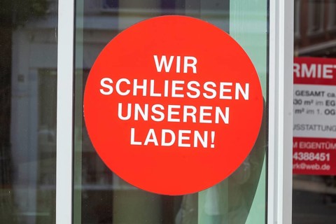Sign we close our shop on a shop window, Germany, Europe
