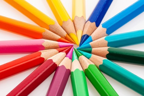 Many different coloured pencils, arranged in a circle, cut-outs, coloured pencils, studio