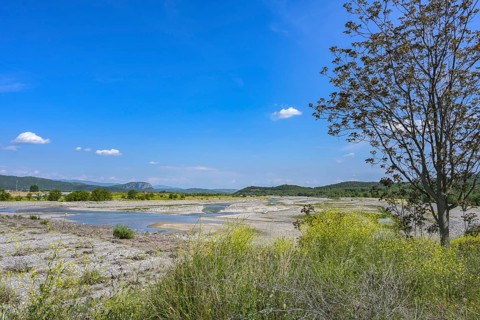 Dried up riverbed of the Pinios near Kalambaka in Thessaly, Greece, low water after heat and