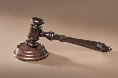 A Mahogany wooden gavel with sound block