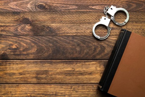 Top view frame with book handcuffs