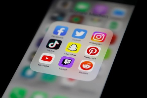 Social media icon, detailed view of a smartphone with social media apps, Facebook, Twitter,