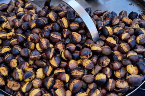 Brown roasted chestnuts roasting in the pan, Rome, Lazio, Italy, Europe