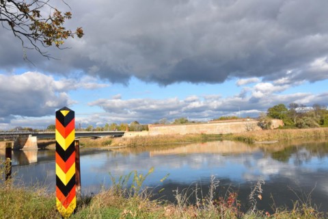 View from Küstrin-Kietz to the fortress and the Oder bridge. View over the river Oder between
