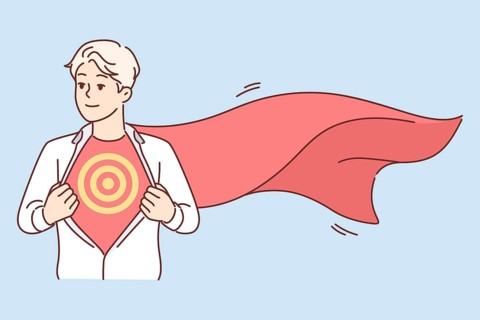 Business man with superhero cape unbuttons shirt and shows target symbolizing ambition and desire