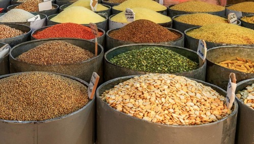 Taroudant, Morocco, 21 March, 2024: close-up view of various types of beans and legumes in steel