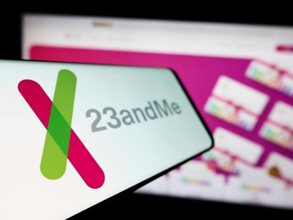 Stuttgart, Germany, 11-03-2023: Mobile phone with logo of American biotechnology company 23andMe