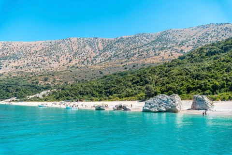 Paradise beach of Kroreza or Krorez seen from the boat on the Albanian riviera in Sarande, Albania,