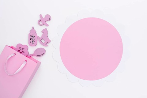 Top view cute little baby girl accesories with copy space
