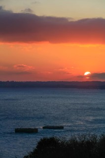 View at sunset from the Pointe de l'Armorique over the bay Rade de Brest, behind the peninsula