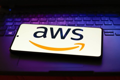 (AWS) logo is displayed on a smartphone screen
