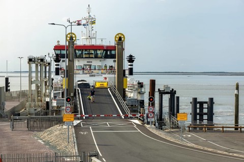 Ferry docking at Holwert pier, ferry terminal, Holwerd, Friesland, Netherlands