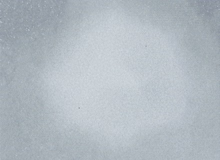 Gray textured canvas with a rough and grainy abstract surface, creating a minimalistic and neutral