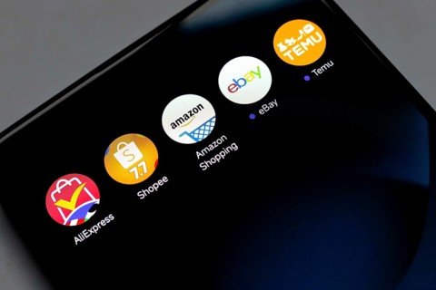 In this photo illustration, the app logo AliExpress, Shopee, Amazon Shopping, Ebay and Temu is