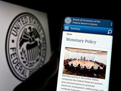 Stuttgart, Germany, 08-27-2022: Person holding cellphone with webpage of United States Federal