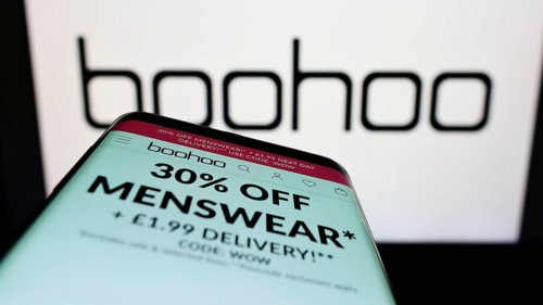 Stuttgart, Germany, 05-28-2022: Mobile phone with website of British fashion company Boohoo Group