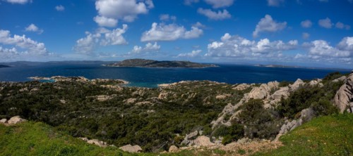 Granite rocks on a hill, bay, island and archipelago of La Maddalena, panoramic view, near