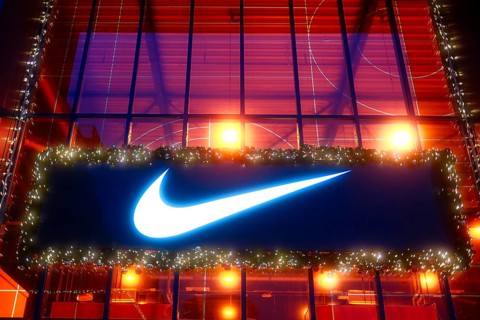 Illuminated Nike brand logo, Christmas decoration, Roermond, Netherlands