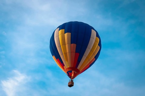 Colorful balloon in the blue sky