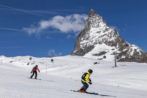 Zermatt, Switzerland, April 12, 2017: People skiing in front of the famous Matterhorn, Europe