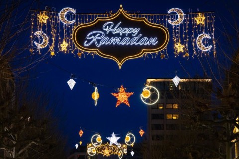 The illuminated lettering Happy Ramadan shines on the evening of 10 March 2024 as part of a light