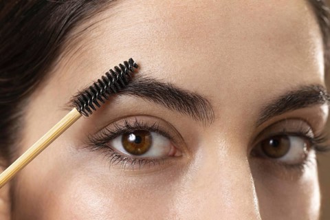 Woman taking care her eyebrows. Resolution and high quality beautiful photo