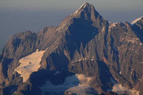 Climate change: Imposing mountain peak with melting glacier in the Bernese Alps | GLobal climate