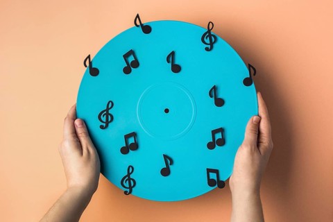 Top view blue vinyl with musical notes