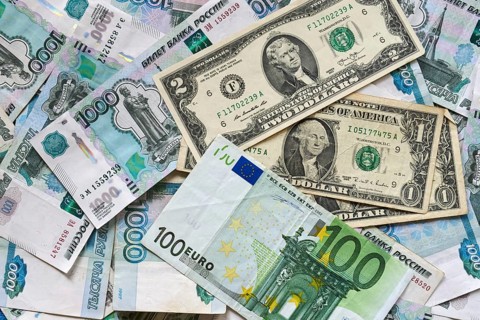 Background of paper bills dollars, euros and rubles