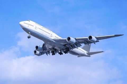 modern airliner against a blue sky